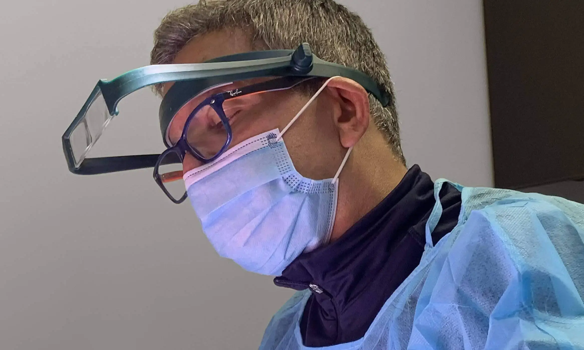 Dr. Zack Charkawi performing a hair transplant surgery at Springs Hair Restoration. The patient is suffering from hair loss.