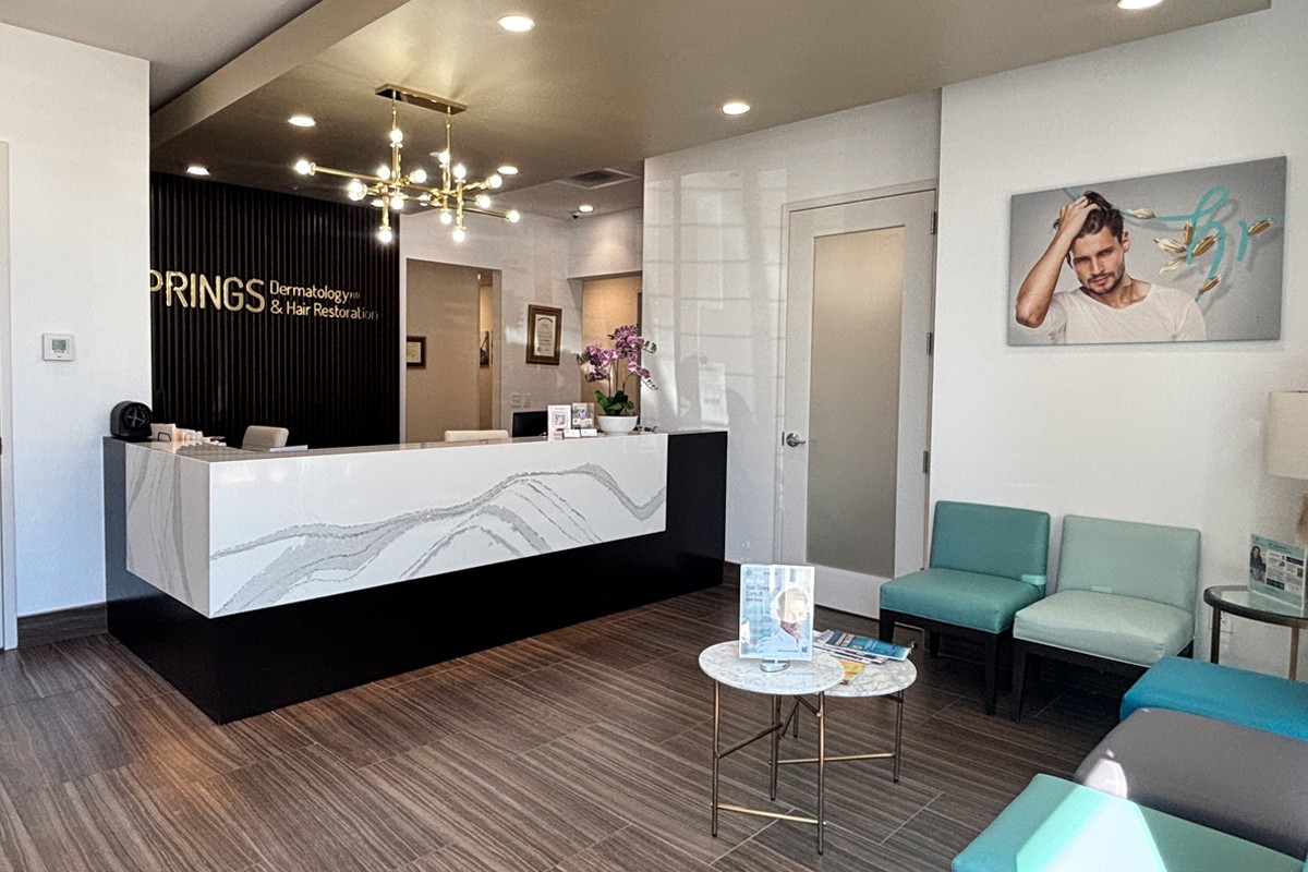 Dr. Zack Charkawi inside Springs Hair Restoration Atlanta clinic, representing physician-led hair transplant and restoration expertise.